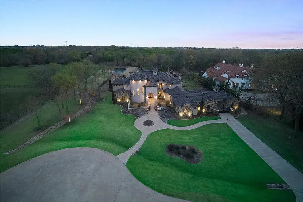 Experience the perfect blend of Texas Hill Country charm and modern urban living in this exceptional 5-bedroom, 6-bathroom home located on a peaceful cul-de-sac and nestled on 2.3 acres of scenic beauty, with the added advantage of being adjacent to an equestrian farm. The thoughtfully designed interiors showcase light woods, warm stones, and expansive windows, creating inviting and bright spaces throughout.