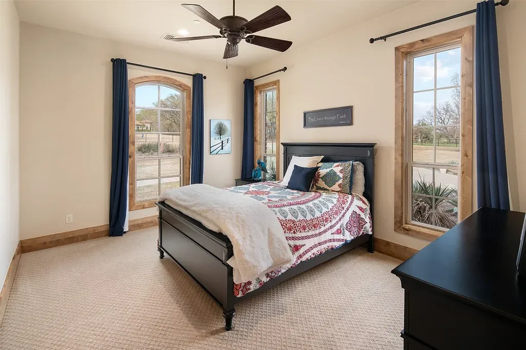 Experience the perfect blend of Texas Hill Country charm and modern urban living in this exceptional 5-bedroom, 6-bathroom home located on a peaceful cul-de-sac and nestled on 2.3 acres of scenic beauty, with the added advantage of being adjacent to an equestrian farm. The thoughtfully designed interiors showcase light woods, warm stones, and expansive windows, creating inviting and bright spaces throughout.