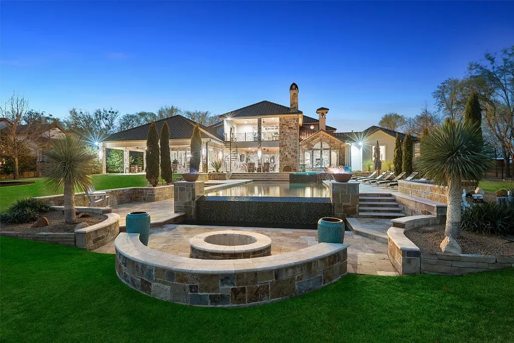 Experience the perfect blend of Texas Hill Country charm and modern urban living in this exceptional 5-bedroom, 6-bathroom home located on a peaceful cul-de-sac and nestled on 2.3 acres of scenic beauty, with the added advantage of being adjacent to an equestrian farm. The thoughtfully designed interiors showcase light woods, warm stones, and expansive windows, creating inviting and bright spaces throughout.