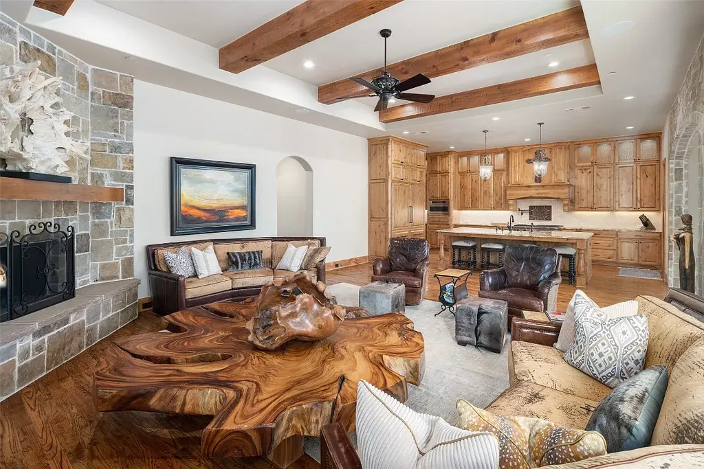 Experience the perfect blend of Texas Hill Country charm and modern urban living in this exceptional 5-bedroom, 6-bathroom home located on a peaceful cul-de-sac and nestled on 2.3 acres of scenic beauty, with the added advantage of being adjacent to an equestrian farm. The thoughtfully designed interiors showcase light woods, warm stones, and expansive windows, creating inviting and bright spaces throughout.