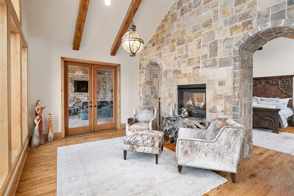 Experience the perfect blend of Texas Hill Country charm and modern urban living in this exceptional 5-bedroom, 6-bathroom home located on a peaceful cul-de-sac and nestled on 2.3 acres of scenic beauty, with the added advantage of being adjacent to an equestrian farm. The thoughtfully designed interiors showcase light woods, warm stones, and expansive windows, creating inviting and bright spaces throughout.