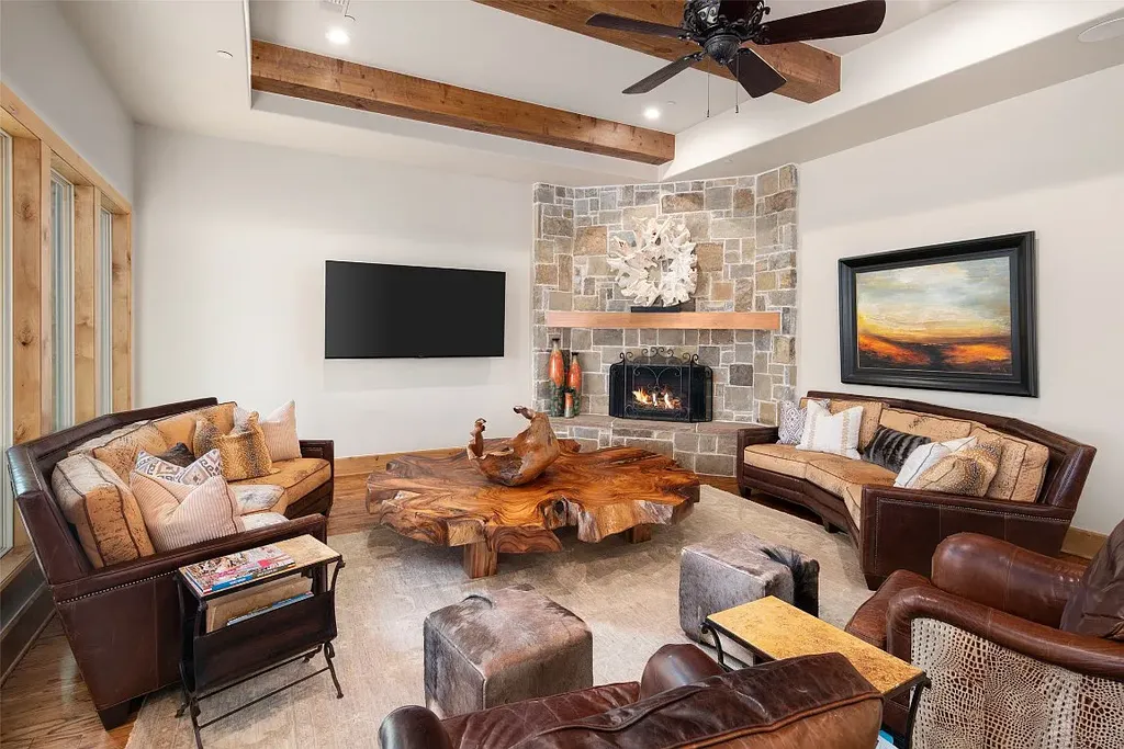 Experience the perfect blend of Texas Hill Country charm and modern urban living in this exceptional 5-bedroom, 6-bathroom home located on a peaceful cul-de-sac and nestled on 2.3 acres of scenic beauty, with the added advantage of being adjacent to an equestrian farm. The thoughtfully designed interiors showcase light woods, warm stones, and expansive windows, creating inviting and bright spaces throughout.