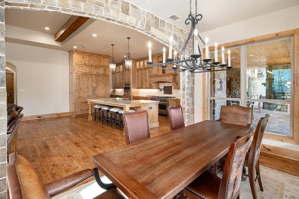 Experience the perfect blend of Texas Hill Country charm and modern urban living in this exceptional 5-bedroom, 6-bathroom home located on a peaceful cul-de-sac and nestled on 2.3 acres of scenic beauty, with the added advantage of being adjacent to an equestrian farm. The thoughtfully designed interiors showcase light woods, warm stones, and expansive windows, creating inviting and bright spaces throughout.