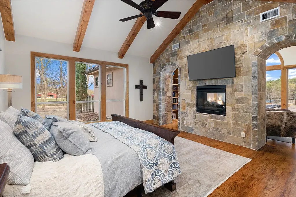 Experience the perfect blend of Texas Hill Country charm and modern urban living in this exceptional 5-bedroom, 6-bathroom home located on a peaceful cul-de-sac and nestled on 2.3 acres of scenic beauty, with the added advantage of being adjacent to an equestrian farm. The thoughtfully designed interiors showcase light woods, warm stones, and expansive windows, creating inviting and bright spaces throughout.