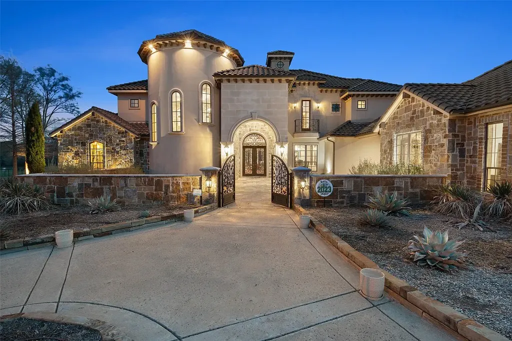 Experience the perfect blend of Texas Hill Country charm and modern urban living in this exceptional 5-bedroom, 6-bathroom home located on a peaceful cul-de-sac and nestled on 2.3 acres of scenic beauty, with the added advantage of being adjacent to an equestrian farm. The thoughtfully designed interiors showcase light woods, warm stones, and expansive windows, creating inviting and bright spaces throughout.