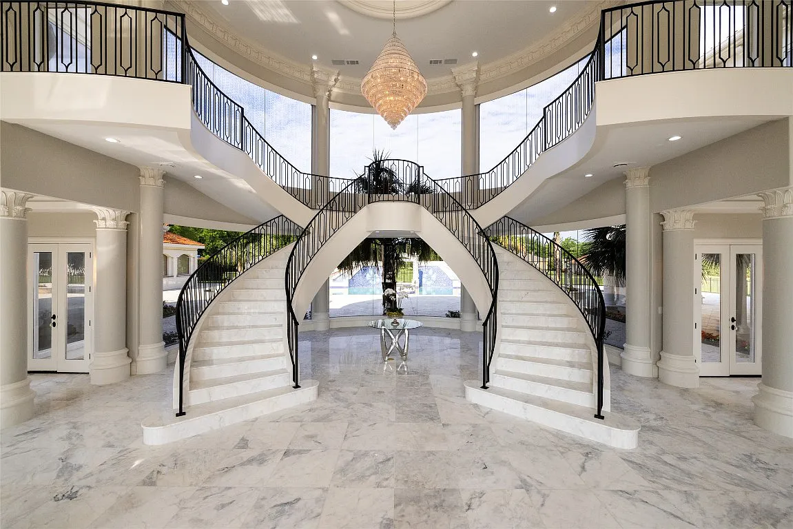 3712 Dustin Trail Home in Dalworthington Gardens, Texas. Experience the epitome of luxury and exclusivity with this breathtaking gated resort home situated on an expansive 8.5-acre estate. Every detail of this grand celebrity-style residence has been meticulously crafted, from the majestic cathedral ceilings to the mesmerizing views of the resort-style oasis.