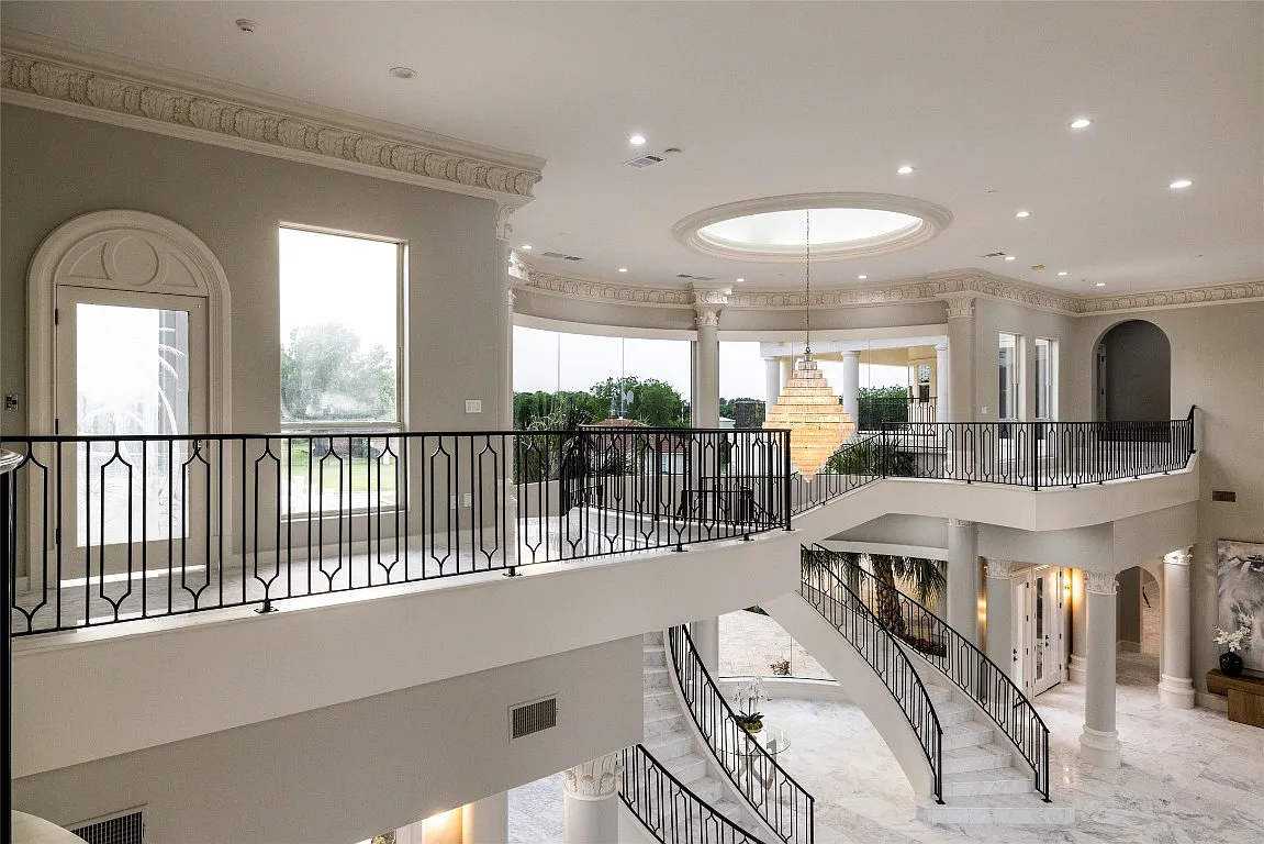 3712 Dustin Trail Home in Dalworthington Gardens, Texas. Experience the epitome of luxury and exclusivity with this breathtaking gated resort home situated on an expansive 8.5-acre estate. Every detail of this grand celebrity-style residence has been meticulously crafted, from the majestic cathedral ceilings to the mesmerizing views of the resort-style oasis.