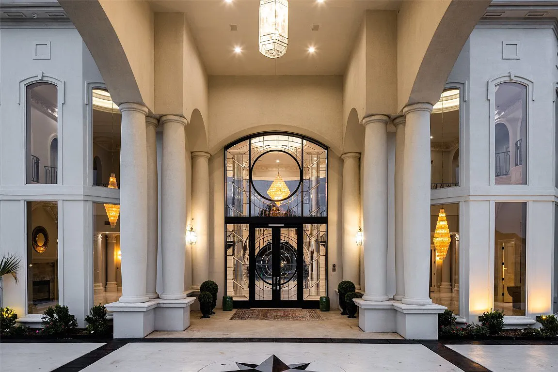 3712 Dustin Trail Home in Dalworthington Gardens, Texas. Experience the epitome of luxury and exclusivity with this breathtaking gated resort home situated on an expansive 8.5-acre estate. Every detail of this grand celebrity-style residence has been meticulously crafted, from the majestic cathedral ceilings to the mesmerizing views of the resort-style oasis.