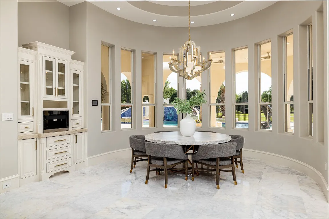 3712 Dustin Trail Home in Dalworthington Gardens, Texas. Experience the epitome of luxury and exclusivity with this breathtaking gated resort home situated on an expansive 8.5-acre estate. Every detail of this grand celebrity-style residence has been meticulously crafted, from the majestic cathedral ceilings to the mesmerizing views of the resort-style oasis.