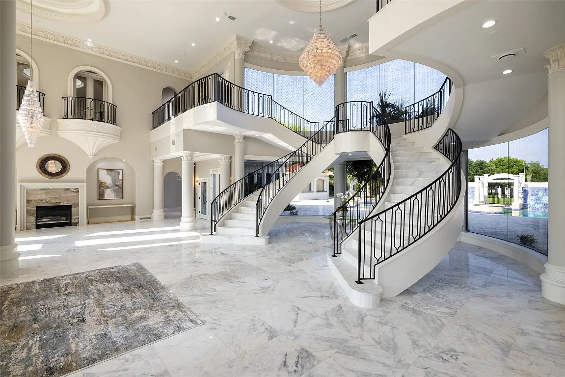 3712 Dustin Trail Home in Dalworthington Gardens, Texas. Experience the epitome of luxury and exclusivity with this breathtaking gated resort home situated on an expansive 8.5-acre estate. Every detail of this grand celebrity-style residence has been meticulously crafted, from the majestic cathedral ceilings to the mesmerizing views of the resort-style oasis.