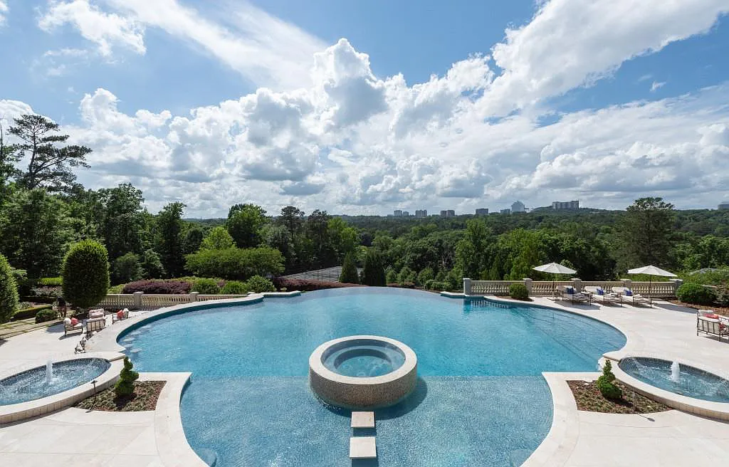 4110 Paces Ferry Road NW Home in Atlanta, Georgia. Experience ultimate privacy and luxury in Atlanta's most breathtaking gated estate, nestled on 17 acres of serene park-like grounds with extensive Chattahoochee River frontage. This remarkable property offers an unmatched array of amenities for the most discerning homeowner.