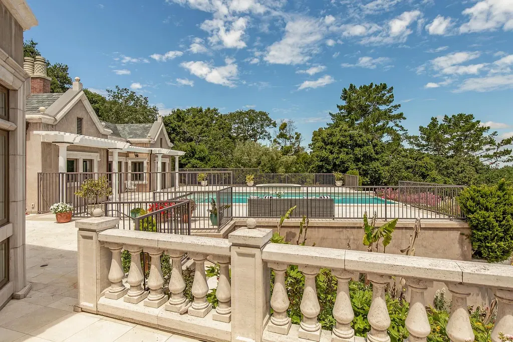 490 Las Pulgas Drive Home in Woodside, California. Step into a world of opulence and European elegance in this extraordinary residence situated on 5.32 acres of private gated land. Crafted with impeccable attention to detail by renowned builder Markay Johnson in 2014, this home offers breathtaking views of the San Francisco Bay. 