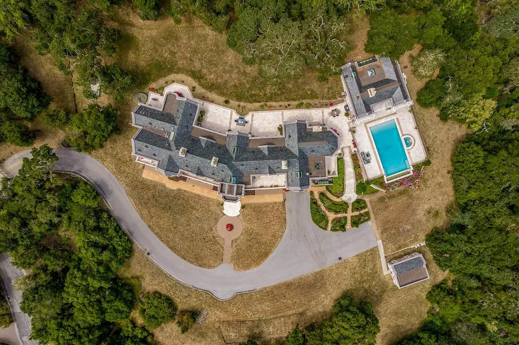 490 Las Pulgas Drive Home in Woodside, California. Step into a world of opulence and European elegance in this extraordinary residence situated on 5.32 acres of private gated land. Crafted with impeccable attention to detail by renowned builder Markay Johnson in 2014, this home offers breathtaking views of the San Francisco Bay. 