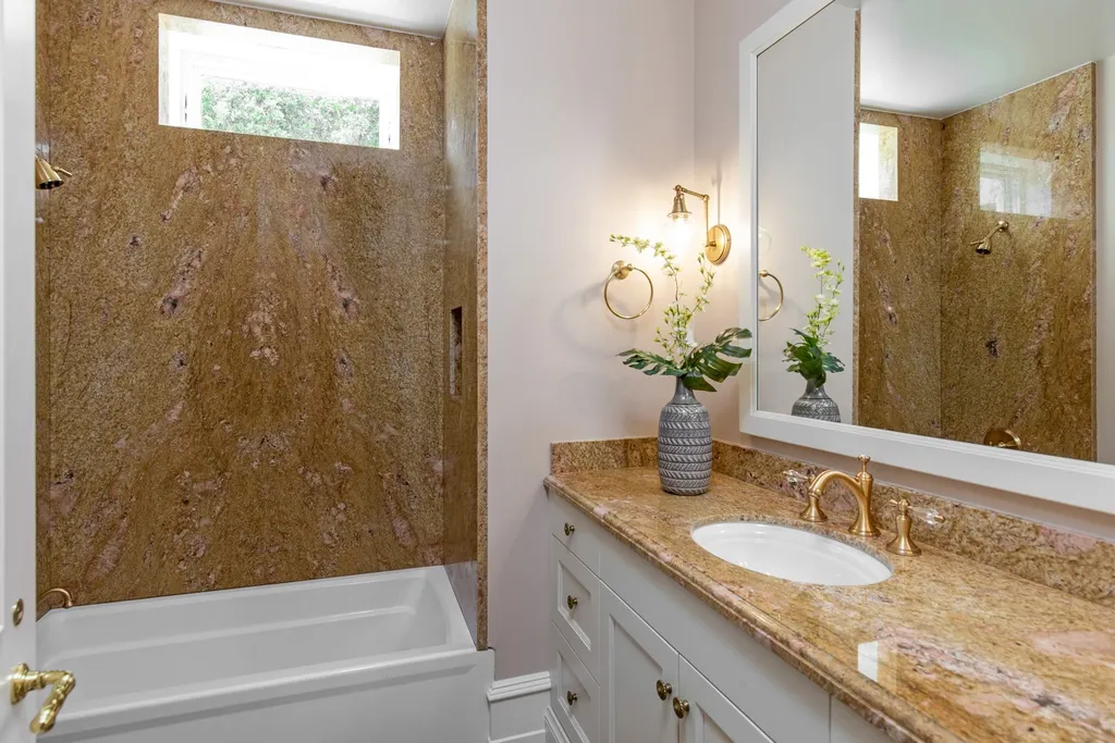 490 Las Pulgas Drive Home in Woodside, California. Step into a world of opulence and European elegance in this extraordinary residence situated on 5.32 acres of private gated land. Crafted with impeccable attention to detail by renowned builder Markay Johnson in 2014, this home offers breathtaking views of the San Francisco Bay. 