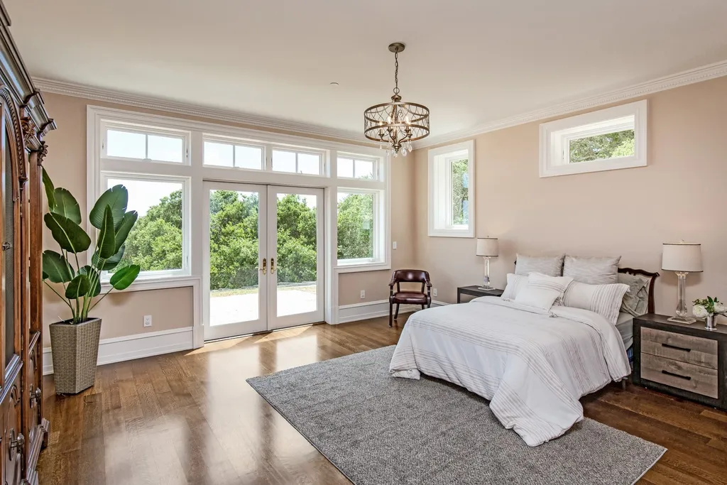 490 Las Pulgas Drive Home in Woodside, California. Step into a world of opulence and European elegance in this extraordinary residence situated on 5.32 acres of private gated land. Crafted with impeccable attention to detail by renowned builder Markay Johnson in 2014, this home offers breathtaking views of the San Francisco Bay. 