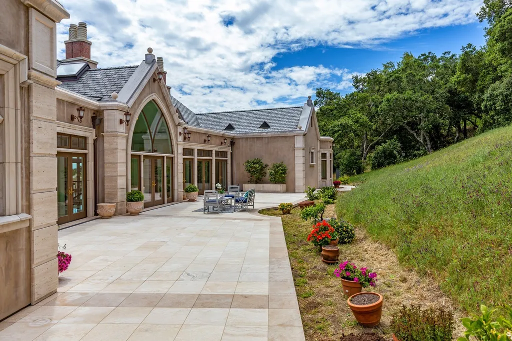 490 Las Pulgas Drive Home in Woodside, California. Step into a world of opulence and European elegance in this extraordinary residence situated on 5.32 acres of private gated land. Crafted with impeccable attention to detail by renowned builder Markay Johnson in 2014, this home offers breathtaking views of the San Francisco Bay. 
