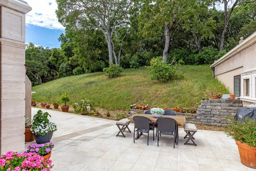 490 Las Pulgas Drive Home in Woodside, California. Step into a world of opulence and European elegance in this extraordinary residence situated on 5.32 acres of private gated land. Crafted with impeccable attention to detail by renowned builder Markay Johnson in 2014, this home offers breathtaking views of the San Francisco Bay. 