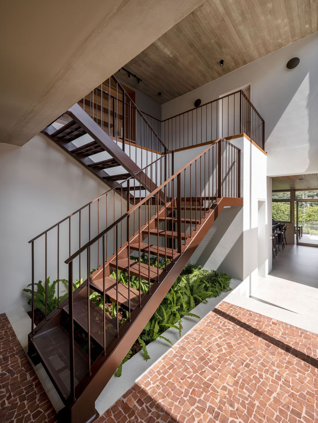 Axial House, harmonious connection with surroundings by TAU Arquitetos