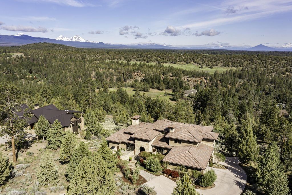 Breathtaking Panoramic Cascade Mountain Views and Rustic Elegance Define this $4.1M Luxurious Custom Home in Bend, OR
