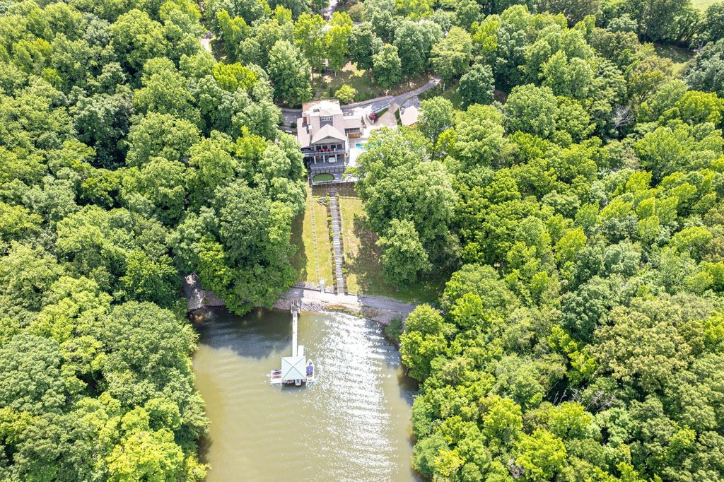 Exceptional Retreat on a Sprawling 9 Acre Estate in Winchester, TN - Ultimate Privacy and Tranquility Asking $6.9 Million