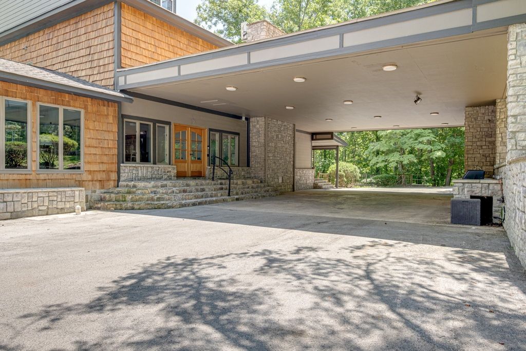 Exceptional Retreat on a Sprawling 9 Acre Estate in Winchester, TN - Ultimate Privacy and Tranquility Asking $6.9 Million