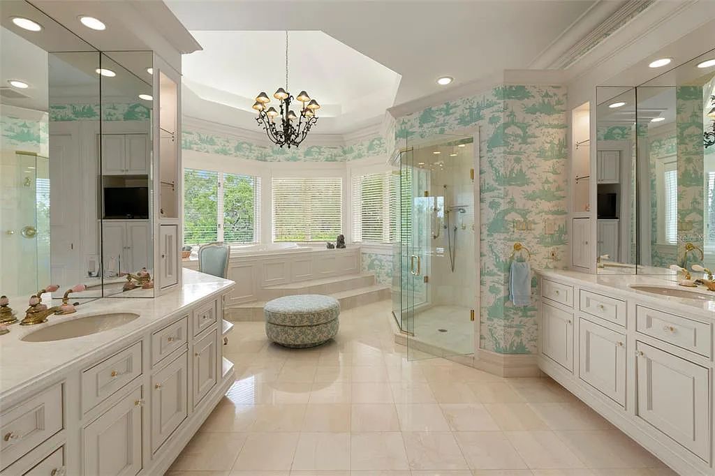 Discover 1405 Kimlira Lane, an exquisite Bayfront estate in Sarasota, Florida. Situated on 1.1 acres with 170 ft of shoreline, this 12,724 square feet masterpiece offers unparalleled luxury.