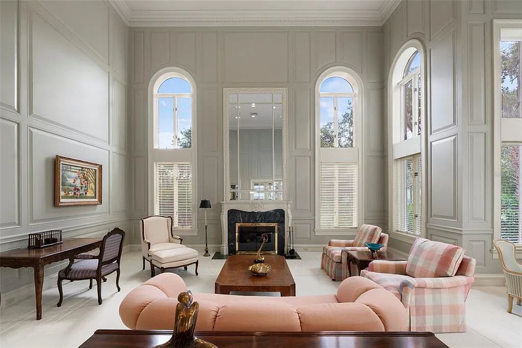 Discover 1405 Kimlira Lane, an exquisite Bayfront estate in Sarasota, Florida. Situated on 1.1 acres with 170 ft of shoreline, this 12,724 square feet masterpiece offers unparalleled luxury.