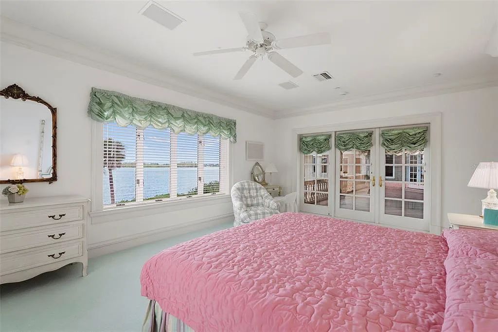 Discover 1405 Kimlira Lane, an exquisite Bayfront estate in Sarasota, Florida. Situated on 1.1 acres with 170 ft of shoreline, this 12,724 square feet masterpiece offers unparalleled luxury.