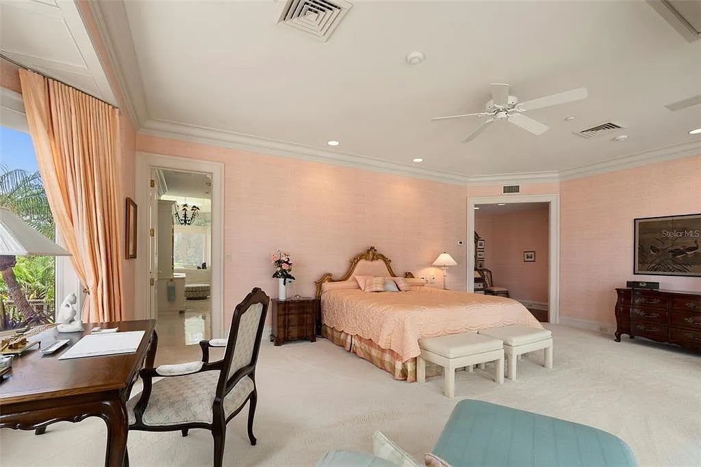 Discover 1405 Kimlira Lane, an exquisite Bayfront estate in Sarasota, Florida. Situated on 1.1 acres with 170 ft of shoreline, this 12,724 square feet masterpiece offers unparalleled luxury.