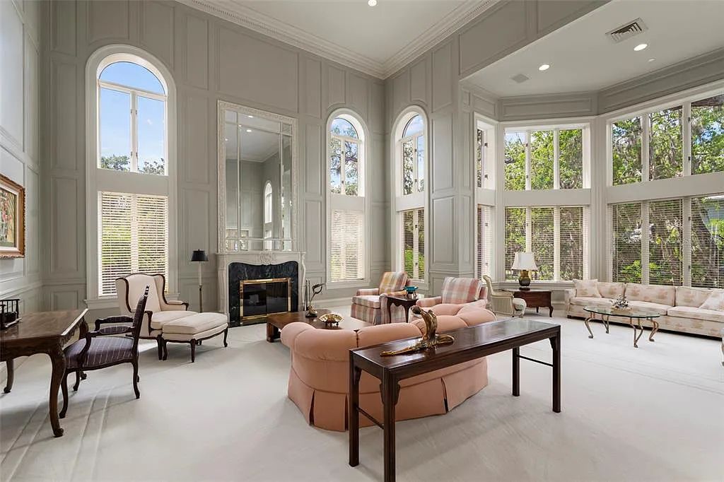Discover 1405 Kimlira Lane, an exquisite Bayfront estate in Sarasota, Florida. Situated on 1.1 acres with 170 ft of shoreline, this 12,724 square feet masterpiece offers unparalleled luxury.