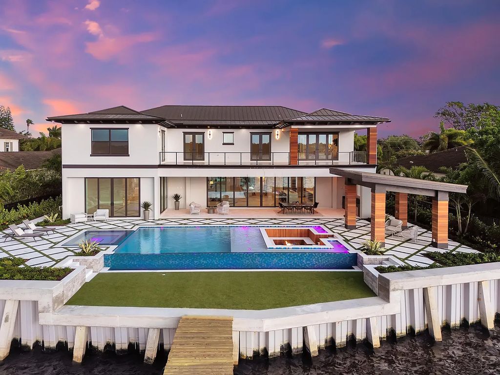 Introducing 55 River Drive, a brand new waterfront residence in Tequesta, Florida. This stunning home offers direct ocean access and boasts 100 feet of wide water views.