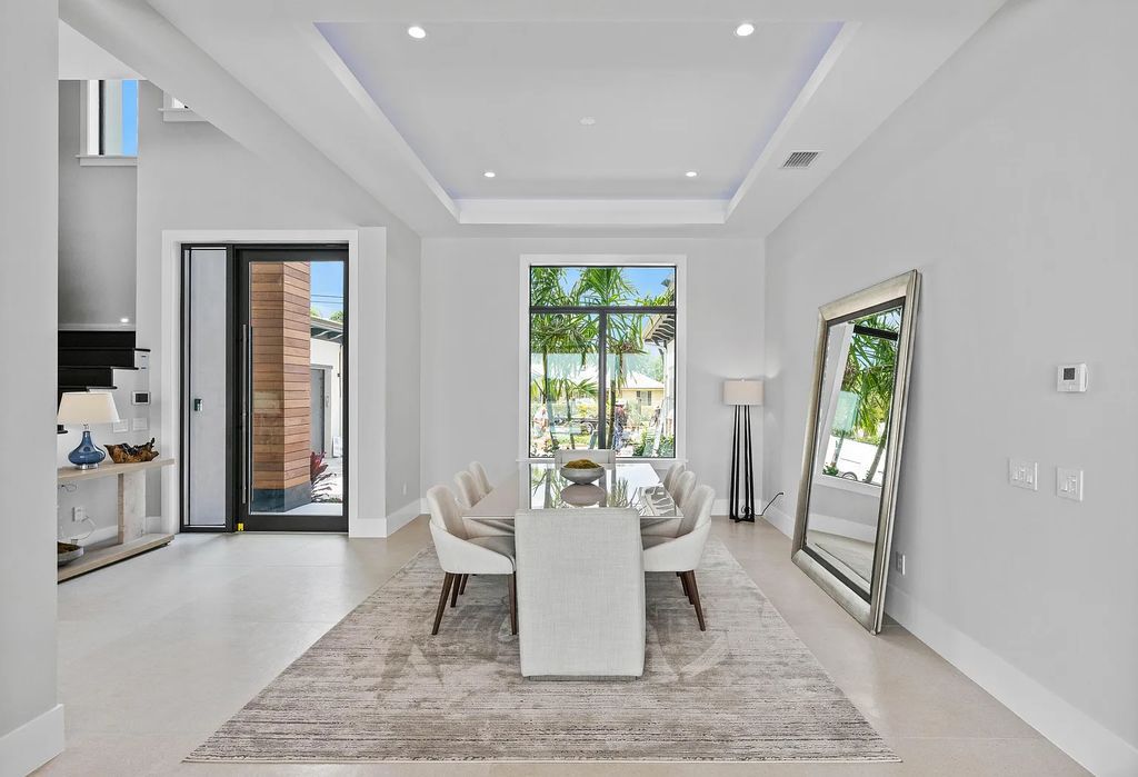 Introducing 55 River Drive, a brand new waterfront residence in Tequesta, Florida. This stunning home offers direct ocean access and boasts 100 feet of wide water views.