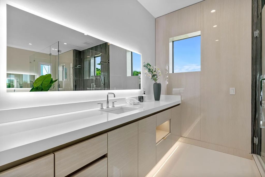Introducing 55 River Drive, a brand new waterfront residence in Tequesta, Florida. This stunning home offers direct ocean access and boasts 100 feet of wide water views.
