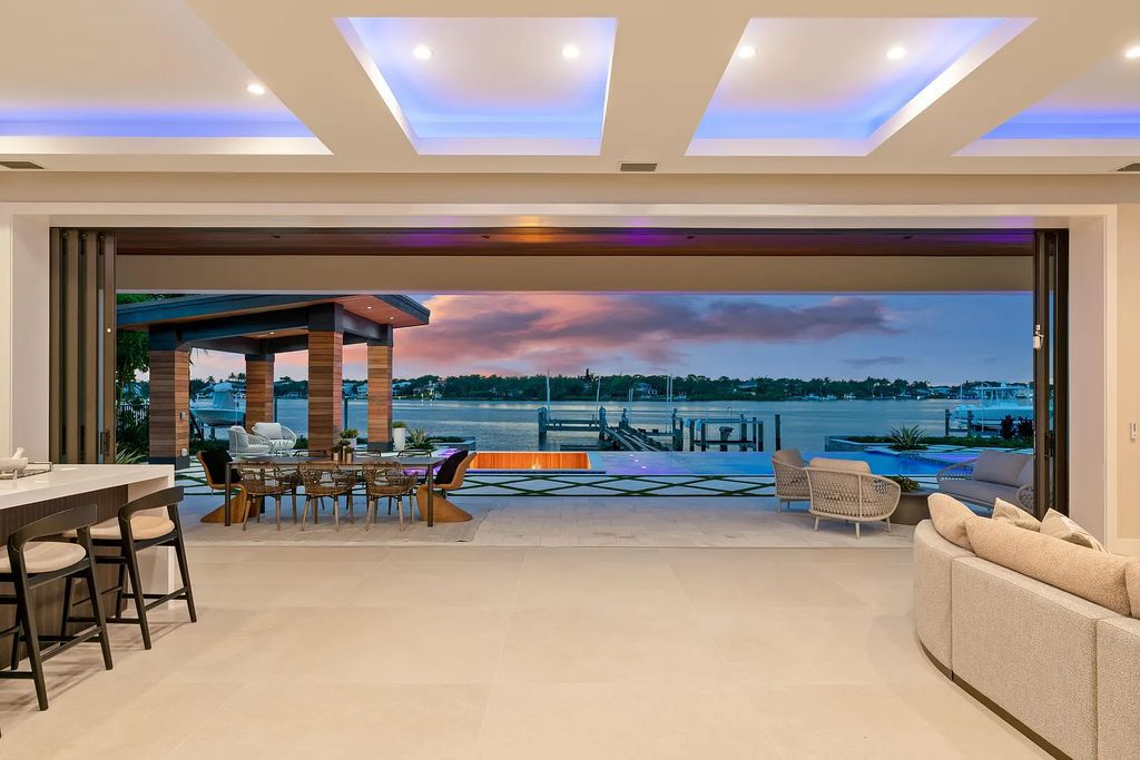 Introducing 55 River Drive, a brand new waterfront residence in Tequesta, Florida. This stunning home offers direct ocean access and boasts 100 feet of wide water views.