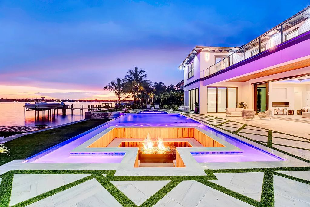 Introducing 55 River Drive, a brand new waterfront residence in Tequesta, Florida. This stunning home offers direct ocean access and boasts 100 feet of wide water views.