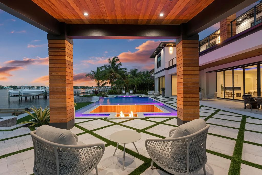 Introducing 55 River Drive, a brand new waterfront residence in Tequesta, Florida. This stunning home offers direct ocean access and boasts 100 feet of wide water views.