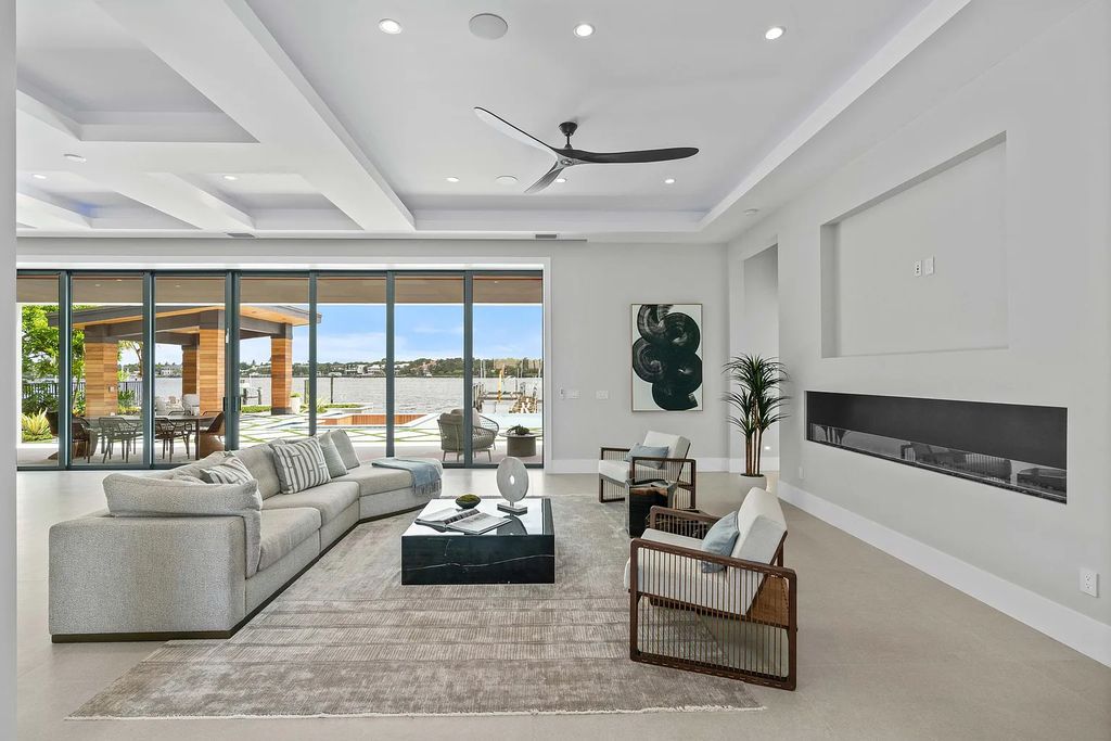 Introducing 55 River Drive, a brand new waterfront residence in Tequesta, Florida. This stunning home offers direct ocean access and boasts 100 feet of wide water views.