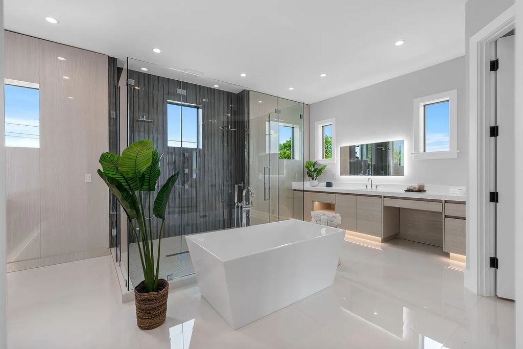 Introducing 55 River Drive, a brand new waterfront residence in Tequesta, Florida. This stunning home offers direct ocean access and boasts 100 feet of wide water views.