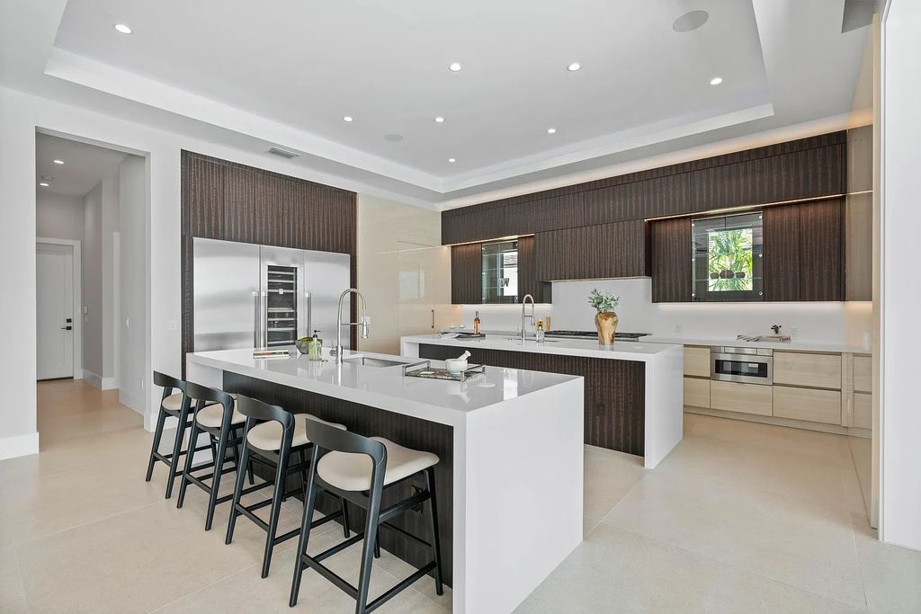 Introducing 55 River Drive, a brand new waterfront residence in Tequesta, Florida. This stunning home offers direct ocean access and boasts 100 feet of wide water views.