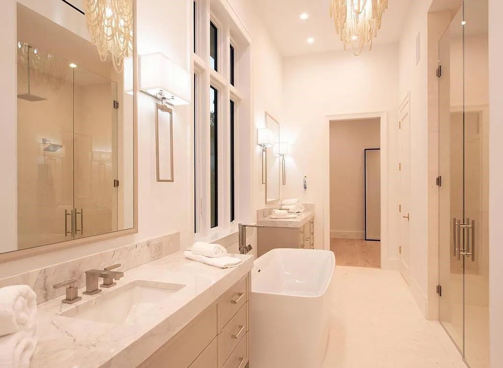 Discover luxurious living at 540 4th Avenue N in Old Naples, Florida. This brand-new home, built in 2023, features 5 beds, 6 baths, and 6,219 sq. ft. of living space.
