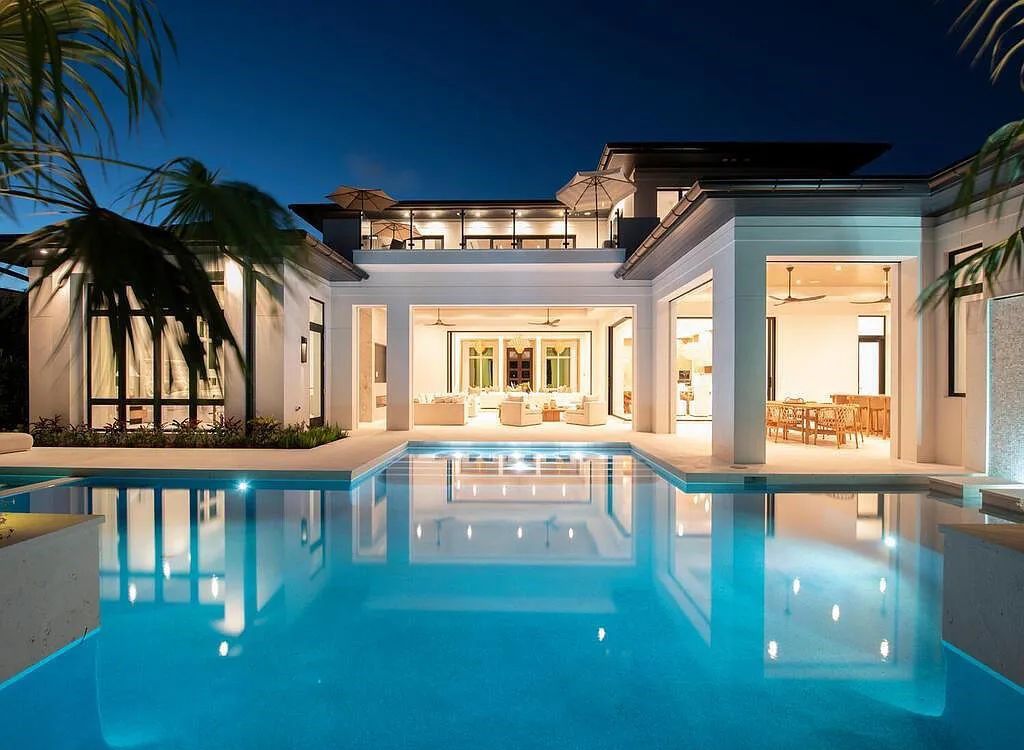 Discover luxurious living at 540 4th Avenue N in Old Naples, Florida. This brand-new home, built in 2023, features 5 beds, 6 baths, and 6,219 sq. ft. of living space.