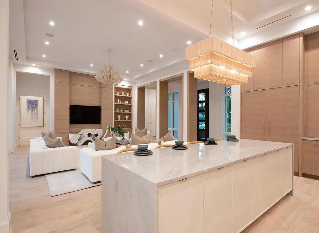 Discover luxurious living at 540 4th Avenue N in Old Naples, Florida. This brand-new home, built in 2023, features 5 beds, 6 baths, and 6,219 sq. ft. of living space.