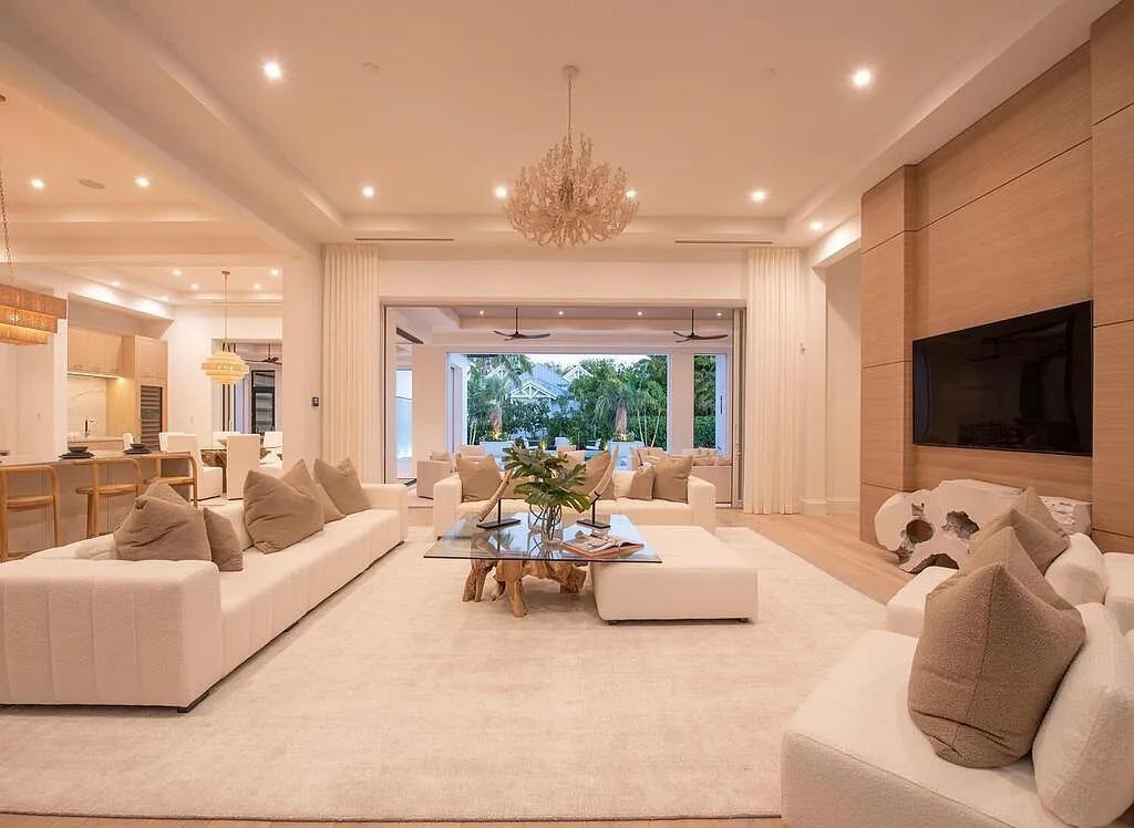 Discover luxurious living at 540 4th Avenue N in Old Naples, Florida. This brand-new home, built in 2023, features 5 beds, 6 baths, and 6,219 sq. ft. of living space.