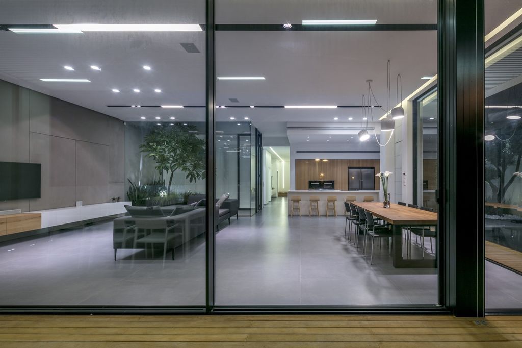House F creates clean, modern & in-outdoor spaces by A.M.N Architecture