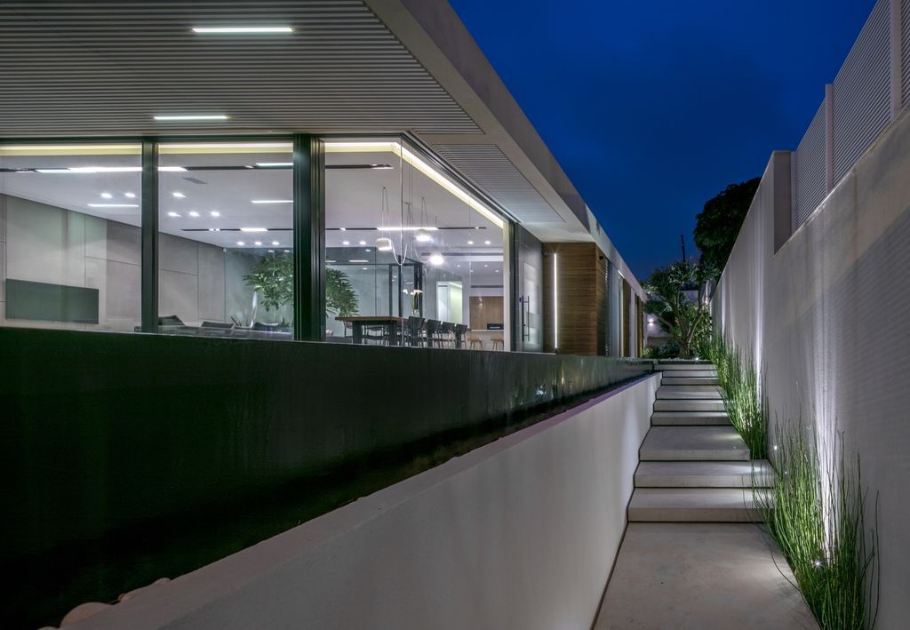 House F creates clean, modern & in-outdoor spaces by A.M.N Architecture
