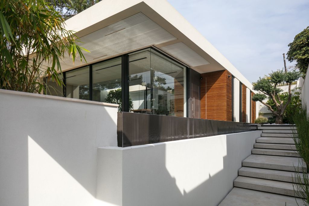 House F creates clean, modern & in-outdoor spaces by A.M.N Architecture