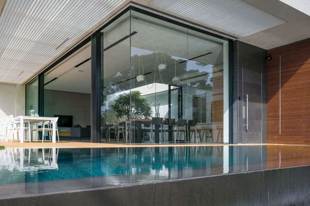 House F creates clean, modern & in-outdoor spaces by A.M.N Architecture