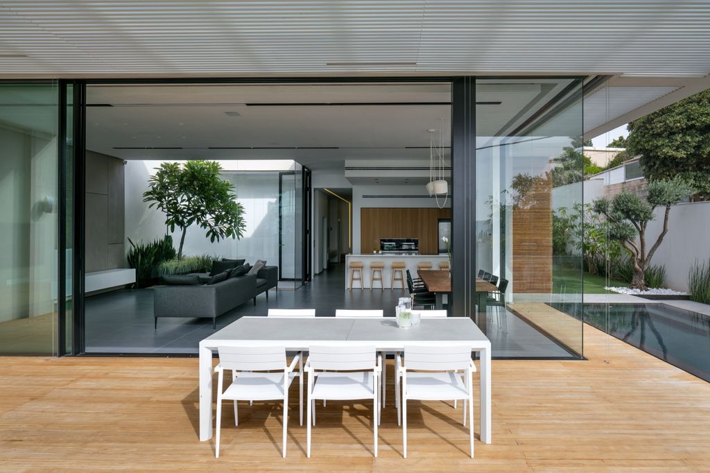 House F creates clean, modern & in-outdoor spaces by A.M.N Architecture