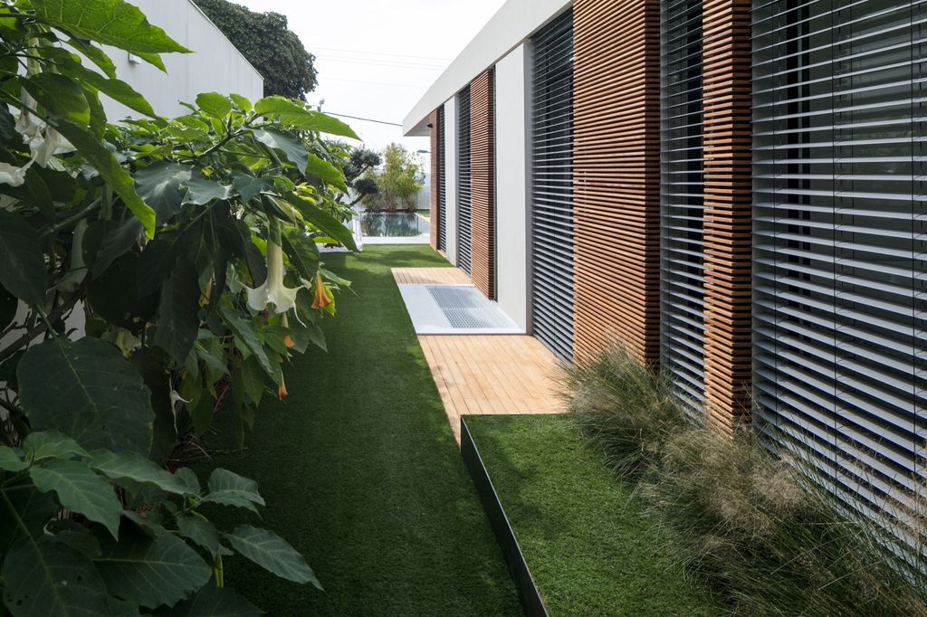 House F creates clean, modern & in-outdoor spaces by A.M.N Architecture