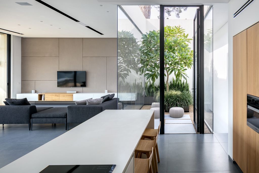 House F creates clean, modern & in-outdoor spaces by A.M.N Architecture